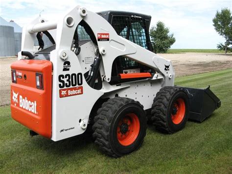 Skid steer loader horns 